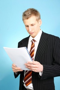 man reading report